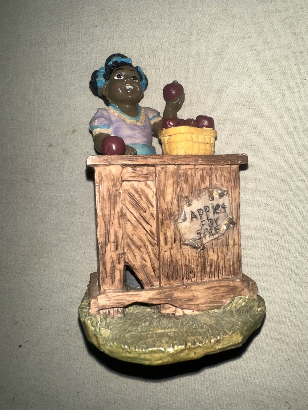 Vintage Collectible Hand-Painted Apple Vendor Figurine - Blue & Brown Home Art